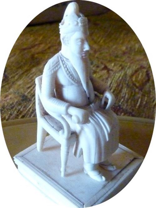 ivory figure with hand